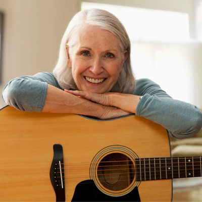 Woman with an acoustic guitar